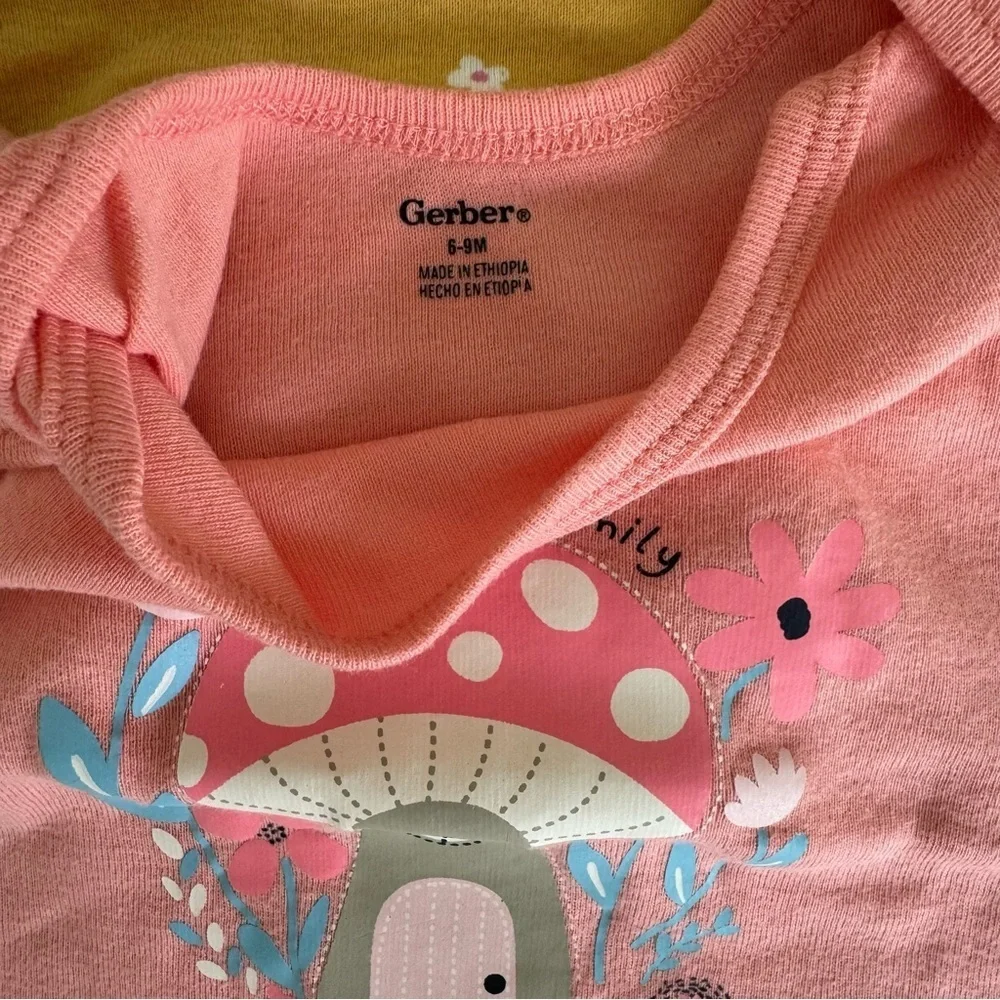 Gerber Set of Four Baby Onesies in Gray, Yellow, Blue, and PinkSize 6-9M